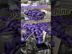 Machine d'emballage à huit stations pour l'alimentation des sacs à serviettes compressés